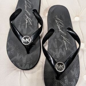 Michael Kors Black Signature Flip Flops with Metallic Emblems